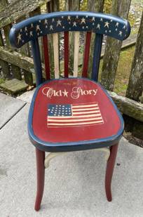 Wooden chair painted in Americana Theme with Old Glory and flag painted on it