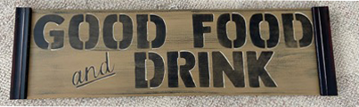 Old Ivory colored Wooden sign with Good Food and Drink stenciled on it