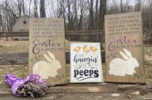 Three stenciled wooden easter signs