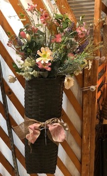 24" tall, skinny, burgundy basket with pink and white flowers