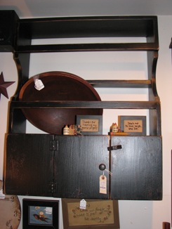 black cupboard with shelves